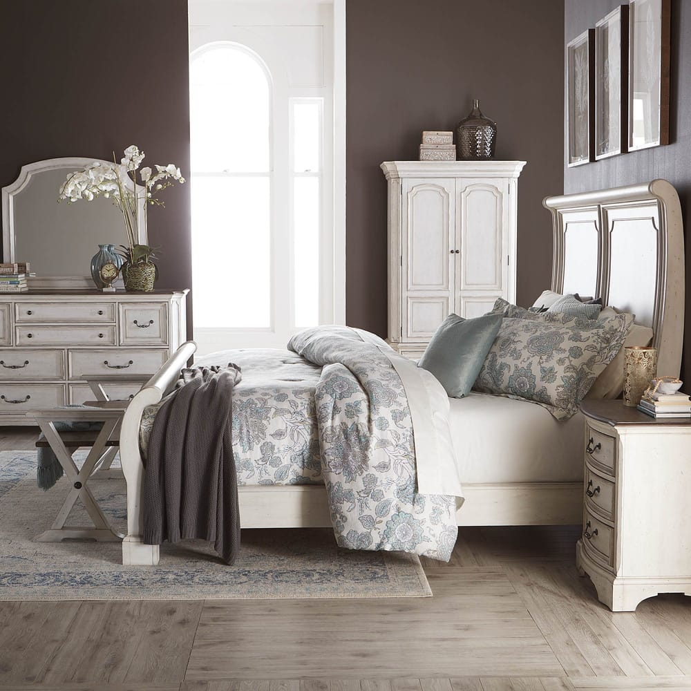 A complete bedroom with coordinated furniture and soft bedding